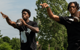 Aidan Chiles, 19, a Michigan State University quarterback, left, and Donald Tabron II, 16, a quarterback at Cass Technical High School, participate in a private workout in Detroit. - David Rodriguez Munoz, USA TODAY Sports