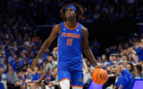 Jan 4, 2025; Lexington, Kentucky, USA; Florida Gators guard Denzel Aberdeen (11) handles the ball during the first half against the Kentucky Wildcats at Rupp Arena at Central Bank Center. Mandatory Credit: Jordan Prather-Imagn Images