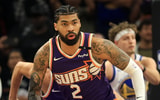 Apr 8, 2025; Phoenix, Arizona, USA; Phoenix Suns center Nick Richards (2) against the Golden State Warriors at Footprint Center. Mandatory Credit: Mark J. Rebilas-Imagn Images