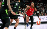 Las Vegas Aces guard Tiffany Mitchell (3) dribbles the ball against Seattle Storm forward Alysha Clark (32) during the first half of a WNBA basketball game at Michelob Ultra Arena. Mandatory Credit: Lucas Peltier-Imagn Images