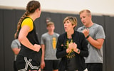 Head coach Jan Jensen instructs freshman center Layla Hays. (Photo by Dennis Scheidt)