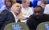 Kentucky’s head coach Mark Pope, left, watches the NCAA Tournament Selection Show inside Rupp Arena Sunday night. March 16, 2025. © Scott Utterback/Courier Journal / USA TODAY NETWORK via Imagn Images