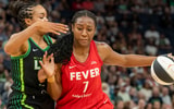 Indiana Fever forward Aliyah Boston (7) dribbles the ball past Minnesota Lynx forward Napheesa Collier (24) in the first half during the Commissioner's Cup final at Target Center. Mandatory Credit: Jesse Johnson-Imagn Images