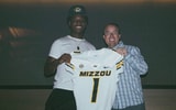 JJ Bush stands with Mizzou coach Eli Drinkwitz (Photo by Mizzou football)