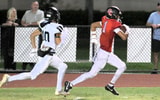 Dylan Faison runs away from a defender during his junior season at Boca Raton (Fla.) Saint Andrew’s.