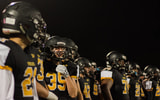 St. Anthony's Friars line up after a New York high school football game.