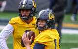 Cal quarterbacks Devin Brown and Jaron Sagapolutele
