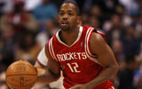 Houston point guard Rafer Alston brings the ball up court during the game against the Clippers