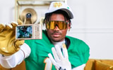 Nick Reddish poses with a camera on his Notre Dame official visit