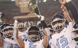 The Bay Port football team celebrates its Wisconsin high school football state championship win over Muskego.