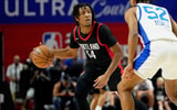 Jul 15, 2024; Las Vegas, NV, USA; Portland Trail Blazers guard Kennedy Chandler (54) controls the ball against Philadelphia 76ers guard Judah Mintz (52) during the first half at Thomas &amp; Mack Center. Mandatory Credit: Lucas Peltier-USA TODAY Sports