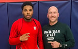 Michigan State EDGE commit Chris Addison with Spartan rush ends coach Chad Wilt (photo courtesy of Chris Addison via Twitter).