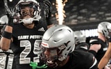 St. Peter's Prep players get ready for a New Jersey high school football game against Don Bosco Prep.