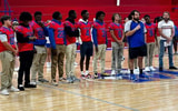 Memorial Day football team introduced at a pep rally.