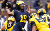 Team Blue quarterback Bryce Underwood (19) makes a pass against Team Maize during the second half of the spring game at Michigan Stadium in Ann Arbor on Saturday, April 19, 2025. Syndication: Detroit Free Press