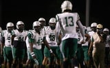 Miami Central enters the field before a Florida high school football game