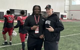 Josiah Hope and Louisville DL coach Mark Hagen on a visit