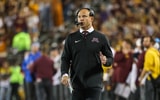 Fleck sidelines