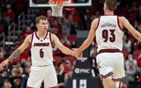 Louisville Cardinals guard Reyne Smith (6) celebrates Noah Waterman's (93) three pointer during their game against the UTEP Miners on Wednesday, Dec. 11, 2024 at the KFC Yum! Center in Louisville, Ky.