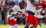 Nov 16, 2024; Stanford, California, USA; Louisville Cardinals running back Isaac Brown (25) runs the ball during the first quarter against the Stanford Cardinal at Stanford Stadium. Mandatory Credit: Bob Kupbens-Imagn Images