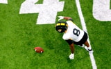 Damon Wilson lines up to fall on a loose ball