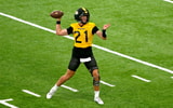 Sam Horn throws a pass