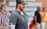TE Coach Alec Abeln provides instruction during group drill