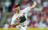 Jun 25, 2025; Cincinnati, Ohio, USA; Cincinnati Reds pitcher Taylor Rogers throws against the New York Yankees in the seventh inning at Great American Ball Park. Mandatory Credit: Aaron Doster-Imagn Images