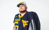 West Virginia offensive lineman Ayden Bussell announces his departure