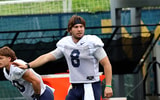 West Virginia quarterback Nicco Marchiol waits for the snap