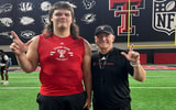 Alexander Herrera with Texas Tech head coach Joey McGuire