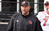 University of Louisville offensive line coach Richard Owens runs a drill during their second practice on Friday, Aug. 2, 2024 at L&N Federal Credit Union Stadium.
