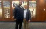 Former Notre Dame defensive lineman Jay Hayes and General Bryan P. Fenton