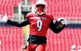 Louisville football's Antonio Watts (9) celebrates with the football during Louisville's first scrimmage on 8/9/2025