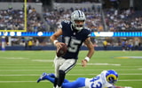 Dallas Cowboys quarterback Will Grier scores on a touchdown run against Los Angeles Rams in the fourth quarter at SoFi Stadium. Credit: Kirby Lee-Imagn Images