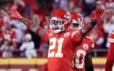 Oct 12, 2023; Kansas City, Missouri, USA; Kansas City Chiefs safety Mike Edwards (21) celebrates after a play against the Denver Broncos during the game at GEHA Field at Arrowhead Stadium. Mandatory Credit: Denny Medley-Imagn Images