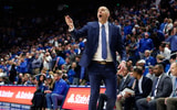Jan 14, 2025; Lexington, Kentucky, USA; Kentucky Wildcats head coach Mark Pope talks to his players during the second half against the Texas A&M Aggies at Rupp Arena at Central Bank Center. Mandatory Credit: Jordan Prather-Imagn Images