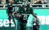 Michigan State's Nick Marsh, right, breaks a tackle attempt by Iowa's John Nestor during the third quarter on Saturday, Oct. 19, 2024, at Spartan Stadium in East Lansing. - Nick King, USA TODAY Sports