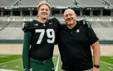 Michigan State OL commit Tristan Comer with Spartan offensive line coach Jim Michalczik.