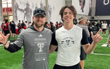 2028 DB Nolan Hawkins with Texas Tech safeties coach Rob Greene