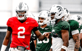Michigan State quarterback Aidan Chiles, left, talks with Nick Marsh during a break in football practice on Tuesday, April 8, 2025, in East Lansing. - Nick King, USA TODAY Sports