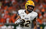 Sep 21, 2019; Fort Collins, CO, USA; Toledo Rockets running back Bryant Koback (22) carries the ball against the Colorado State Rams in the first quarter at Sonny Lubrick Field at Canvas Stadium. Mandatory Credit: Ron Chenoy-Imagn Images