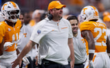 Aug 30, 2025; Atlanta, Georgia, USA; Tennessee Volunteers head coach Josh Heupel talks to Syracuse Orange head coach Fran Brown before a game at Mercedes-Benz Stadium. Mandatory Credit: Brett Davis-Imagn Images