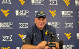 West Virginia head coach Rich Rodriguez talks with the media following the Robert Morris win