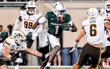 Michigan State's Omari Kelly, center, runs after a catch against Western Michigan during the fourth quarter on Friday, Aug. 29, 2025, in East Lansing. - Nick King, USA TODAY Sports