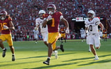 USC Trojans running back Eli Sanders (1) is pursued by Missouri State Bears safety J.J. O'Neal (16) and safety Maguire Neal (0) on a 73-yard touchdown reception in the first half at United Airlines Field at Los Angeles Memorial Coliseum