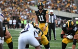 Mark Gronowski awaits a snap in the game against Albany. (Photo by Dennis Scheidt)