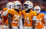 Aug 30, 2025; Atlanta, Georgia, USA; Tennessee Volunteers defensive lineman Jordan Ross (29) celebrates with defensive back Ty Redmond (4) after a tackle against the Syracuse Orange in the third quarter at Mercedes-Benz Stadium. Mandatory Credit: Brett Davis-Imagn Images