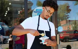Seth Trimble at his newly acquired Ben & Jerry's on Franklin Street.