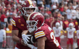 Iowa State quarterback Rocco Becht hands off to running back Carson Hansen. (Photo by Nirmalendu Majumdar/Ames Tribune)